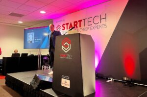 Ian Groves on stage at the event